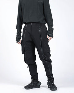 black pants with zippers on the legs