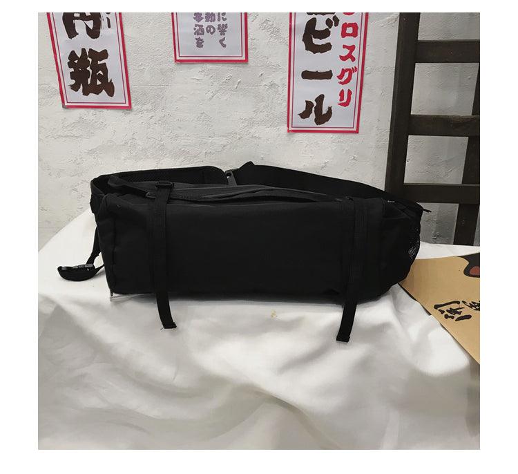 City Glow Reflective Messenger Bag