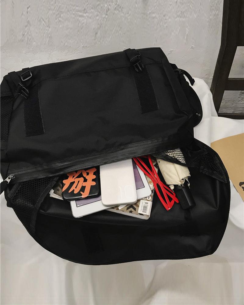 City Glow Reflective Messenger Bag