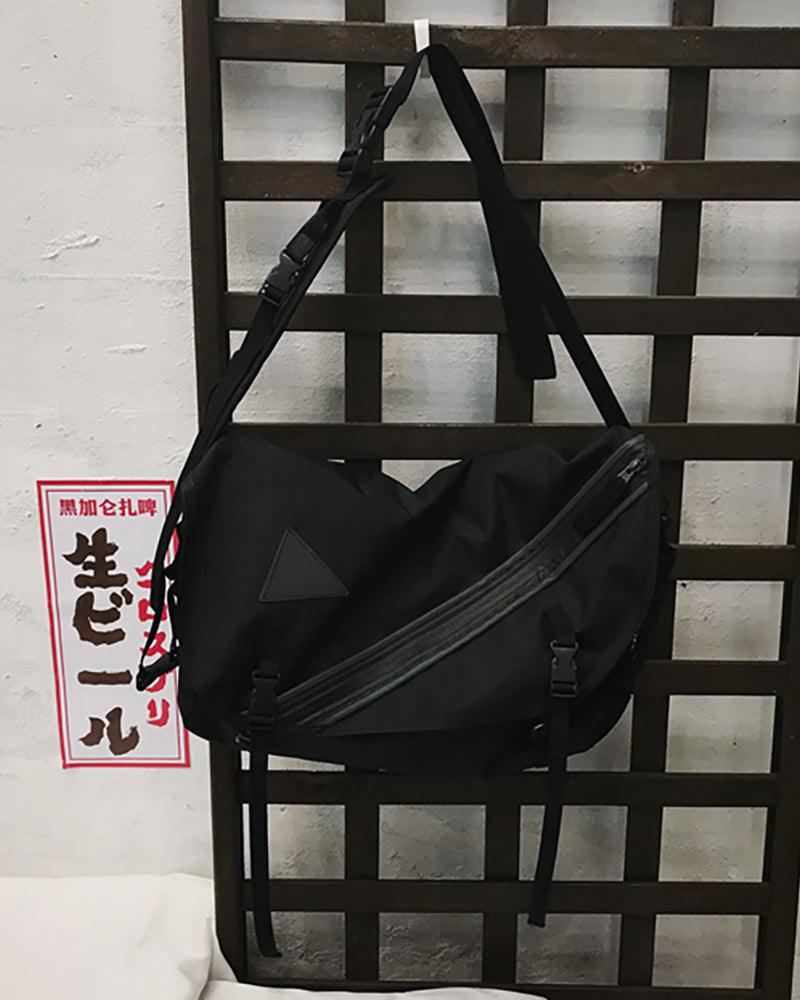City Glow Reflective Messenger Bag